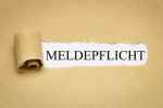 © magele-picture - stock.adobe.com Foto: Aufgerissenes Papier mit Aufschrift Meldepflicht